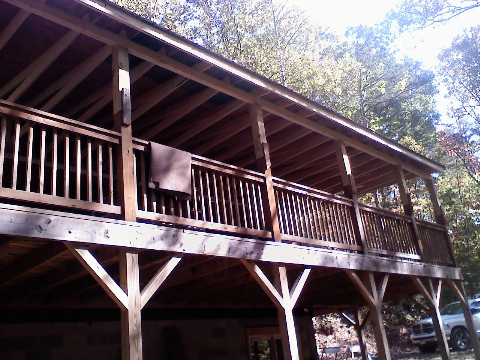 Timber framing under a new elevated porch and deck — Roof Leak Repair in Runnells by Roofing Brothers